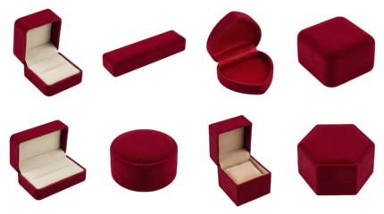 Red velvet jewelry box set including ring, necklace, earring, watch, and heart shaped containers isolated. Elegant gift packaging collection.
