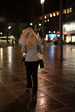 young woman walking in the city
