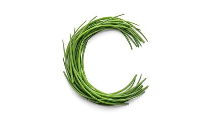 Creative arrangement of fresh green chives forming the letter c on white background