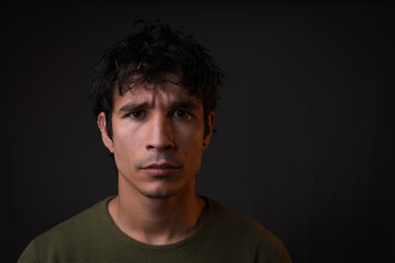 Obraz premium Serious and angry young latino man