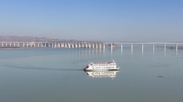 Cruise Ship and Sanmenxia Bridge, Yellow River China