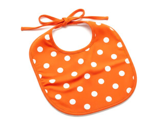 Bright orange bib with white polka dots