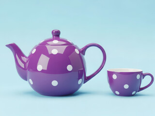 Vibrant purple teapot with polka dots and matching cup