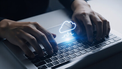 Hands typing on laptop keyboard with glowing blue thumbs up icon