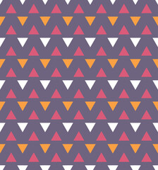 Seamless geometric triangle pattern on muted purple background