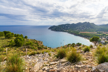 Scenic aerial landscape of Canyamel, Mallorca, with resort buildings, green countryside,...