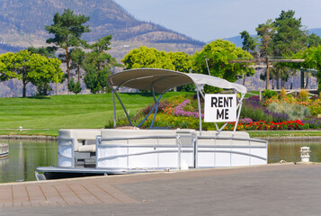 Pontoon boat rental Waterfront park lagoon summer sunshine warm vacation tourism © Hamilton Productions