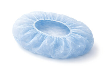 Photorealistic 3D macro product-shot of a single unbranded nonwoven surgical bouffant cap laid flat, visible fiber texture and soft crinkles, elastic edge gathered evenly, ultra-detailed micro-texture