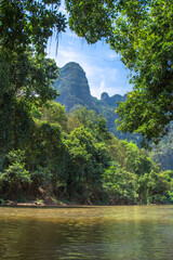 The river flows through the theTthailand jungle © Miroslaw