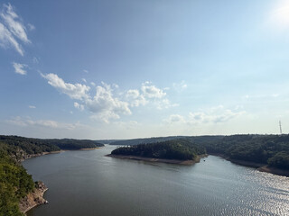 Lake Reservoir Surrounded by Forested Hills