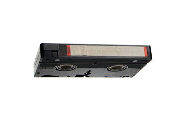Obraz premium Vintage black VHS video cassette with blank label isolated on a white back