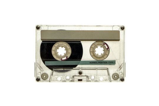 Vintage transparent audio cassette tape Type I with blank label isolated on white back