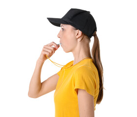 Professional referee blowing whistle on white background
