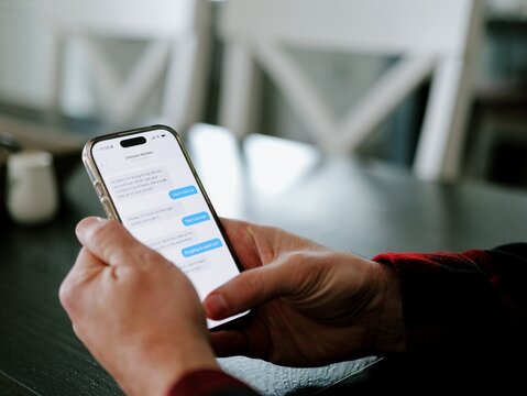 Scammer Sends SMS 2FA Intercept Scam Smishing Attempt Through OTP Code - Cybersecurity Mobile Phishing Campaigns Increase Strong MFA Rules Concept