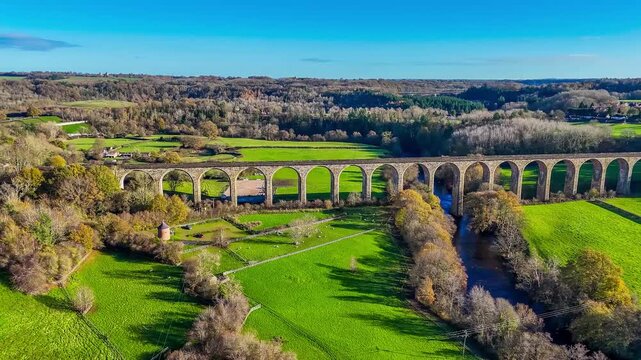 A distant rotating aerial view of the cefn viaduct near Chirk, Wales