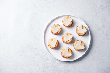 Salami sausage and cheese slices in the form of hearts and crackers for Valentine's day holidays