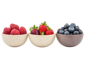 Fresh summer berries in the bowls Blueberries strawberries raspberries shoot from the top isolated on white background