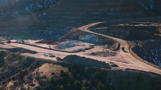 Mining area with trucks and vehicles quarry industrial scene, aerial video, Colorado 4K