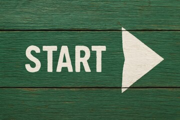 Initiating action start symbol on green graphic design inspirational environment view