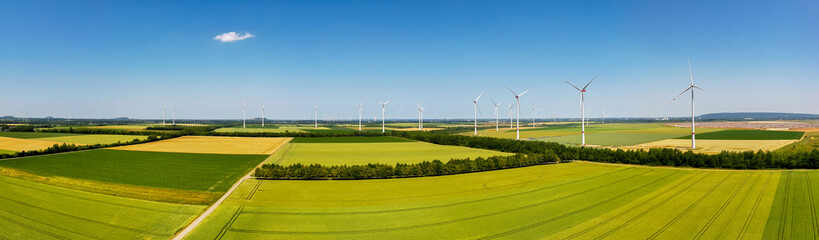 a modern wind turbine park in the countyside panorama © Tobias Arhelger