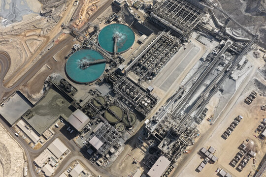 Copper-type mineral processing plant with flotation ponds