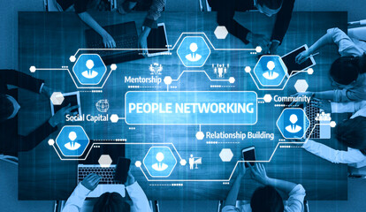 This image shows diverse professionals in an office setting engaged in people networking, utilizing...
