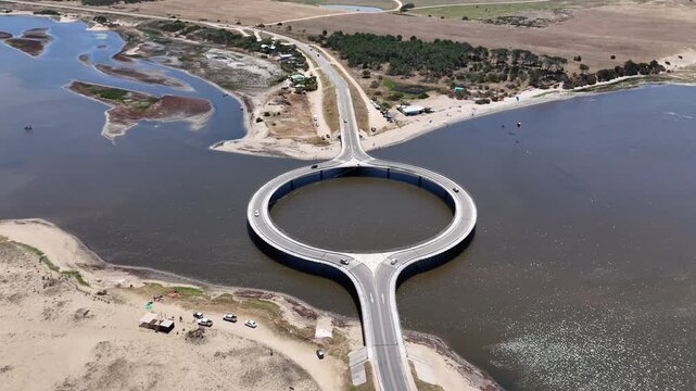 outdoors, drone, aerial, water, uruguay, travel, sky, bridge, blue, sea, ocean, nature, laguna garzon, coast, architecture, aerial view, waves, view, vacation, tranquil, tourism, summer, shoreline, se