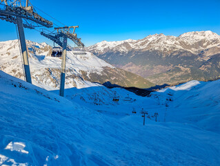 Aerial of Valfrejus ski slopes and winter mountain panorama