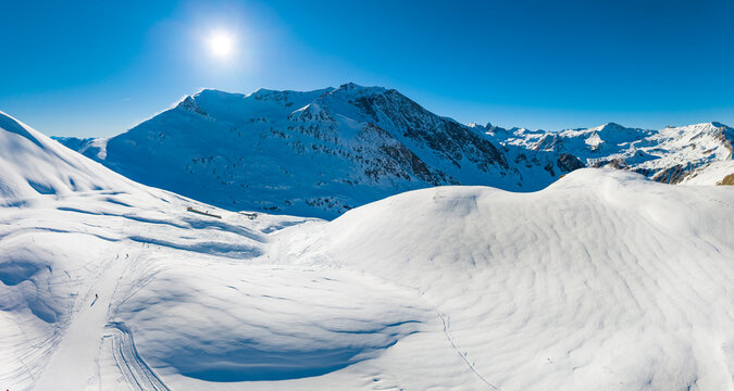 Aerial of Valfrejus ski slopes and winter mountain panorama