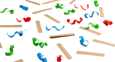 Colorful curly confetti and plain rectangular strips are scattered in a playful composition suggesting celebration and joy party festive streamers ribbons transparent background