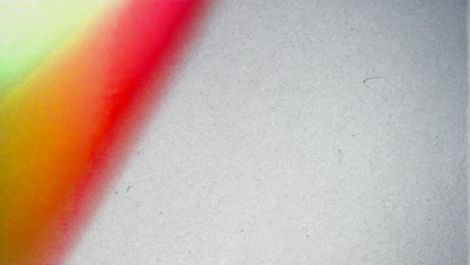 Retro film texture background with grain, dust and light leak. Analog film burn effect image