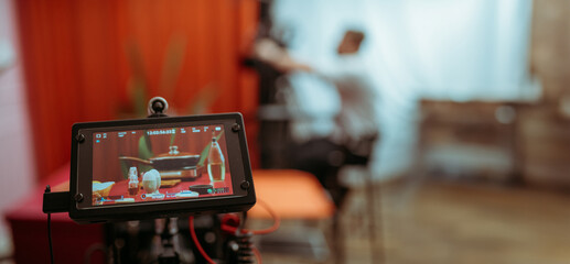 Film set, monitors and modern shooting equipment. Film crew, lighting devices, monitors, playbacks - filming equipment and a team of specialists in filming movies, advertising and TV series