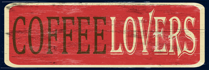 Aged and worn coffee lovers sign on wood