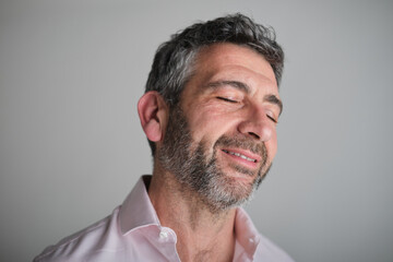 Obraz premium close up shot of Mature man enjoying moment of calm and peace