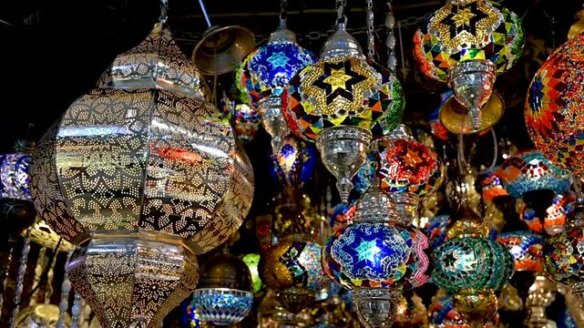 Istanbul,turkey,august 4, 2025. Vibrant turkish mosaic and ottoman style lamps hanging in a shop. Traditional, colorful glass and metal lanterns glowing at a bazaar