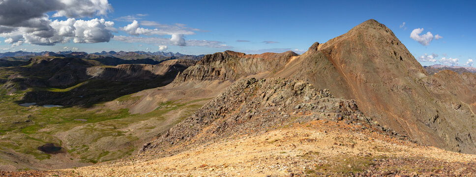 This Colorado summer mountain panorama features colorful 13er Jones Mountain, located between Lake City and Silverton in the beautiful San Juan Mountains.