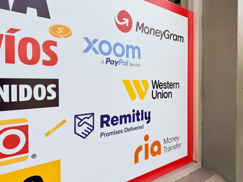 Store facade with logos of MoneyGram, Remitly, Xoom, Western Union and Ria. Remittance point for various financial companies. Mexico January 21 2026