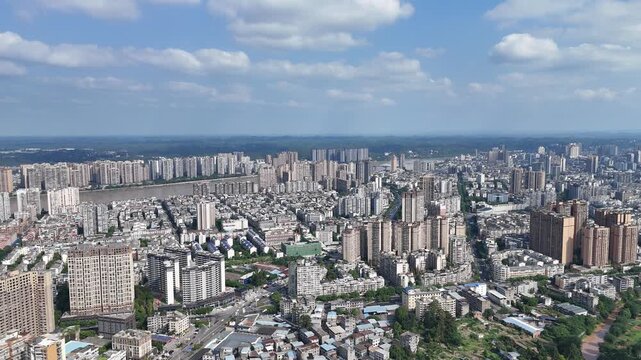 Leshan Cityscape, Sichuan Province - Aerial Urban View with Blue Sky