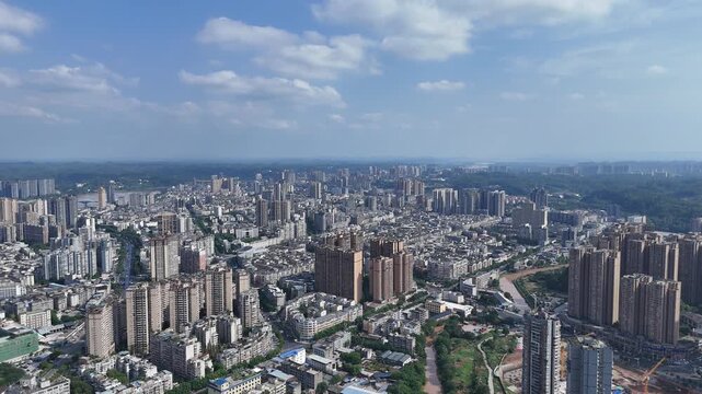 Leshan Sichuan Cityscape with Blue Sky and White Clouds