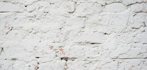 Rough white painted brick wall texture with weathered exposed brick, showing aged masonry details, subtle cracks, and an authentic surface ideal for architectural or design backgrounds.