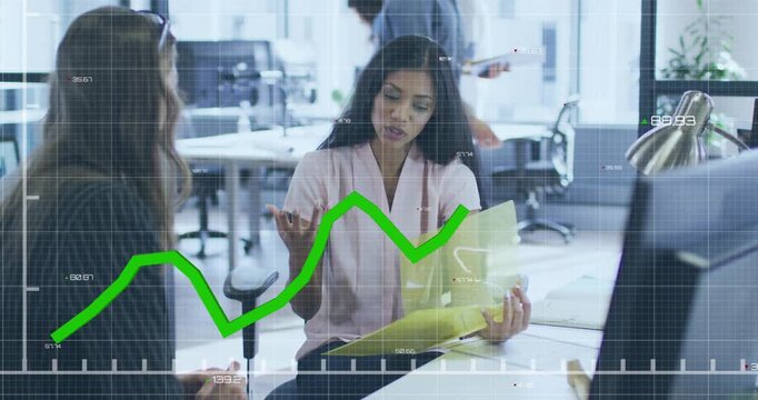 Woman lifting left hand, explaining papers in yellow folder to colleague, business chart aligning
