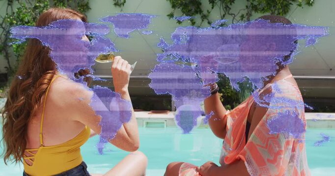 2 women starting chat poolside, raising glasses and sipping under purple map overlay lifestyle