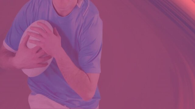 Male athlete moving forward, holding white ball, initiating pink purple swirl sweep for sports ad