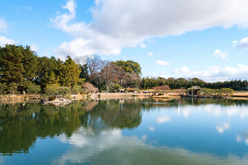 Fototapeta premium Korakuen in Okayama, Japan. It is a traditional Japanese Garden. It is one of the Three Great Gardens of Japan built in 1700s