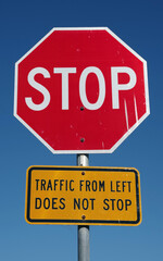 STOP CROSS TRAFFIC DOES NOT STOP sign