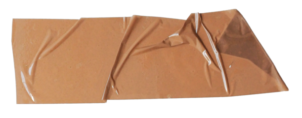 Piece of semi-transparent brown tape on transparent background 