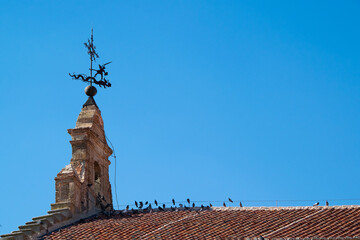 Church weather vane and rooftop detail, penaranda de bracamonte, spain