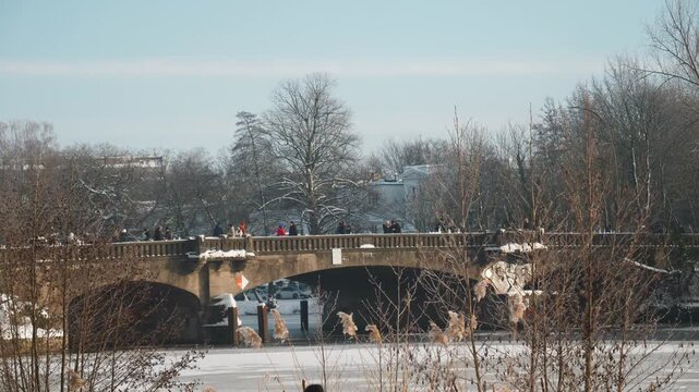 Footage of the wintery, frozen Outer Alster in Hamburg covered with heavy snow