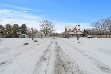 Beautiful winter landscape covered with fresh white snow, featuring pine trees and a clear blue sky. This image is perfect for travel, holiday, Christmas, New Year, nature background, seasonal design,