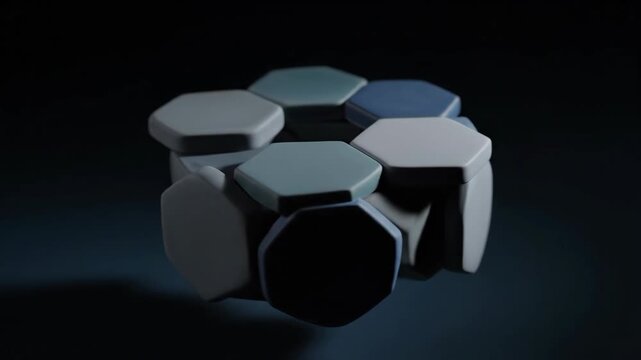 Abstract rotating cluster of cool toned hexagonal prisms in dark space.